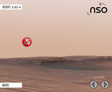 A cartoon red ball with a smiling face high in the air. The background shows the red, sandy landscape of the planet Mars. A text box in the top-left of the picture tells us that the ball has bounced to a height of 2.83 metres. 